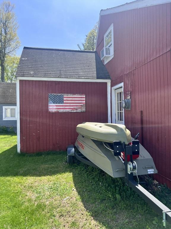 18 Laurel Ave, Sterling, MA 01564 - view of side of property with a yard and cooling unit