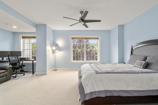 carpeted bedroom with ceiling fan