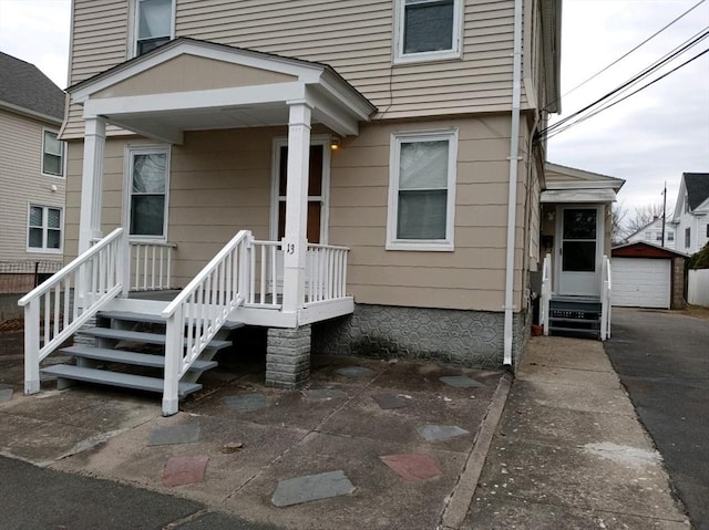13 William St, Westfield, MA 01085 - entrance to property with a detached garage and driveway