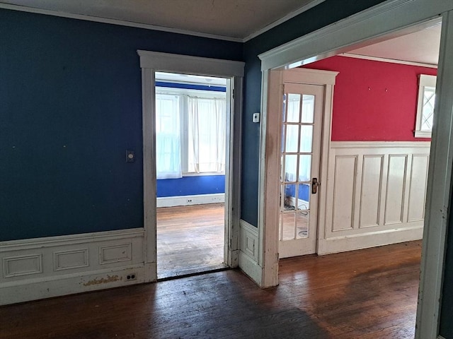 281 Elmwood Ave, Quincy, MA 02170 - foyer featuring crown molding, a wainscoted wall, and wood finished floors