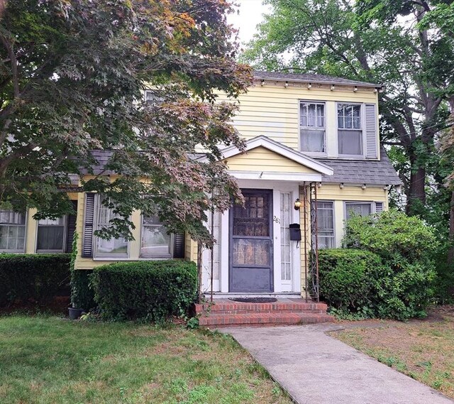 281 Elmwood Ave, Quincy, MA 02170 - view of front of home with a front lawn