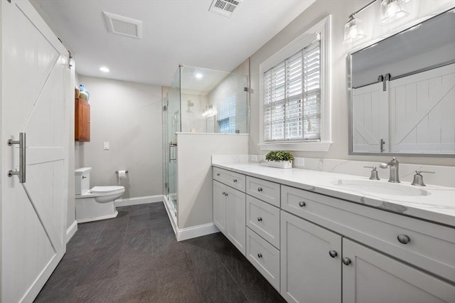 bathroom with toilet, a shower stall, vanity, baseboards, and recessed lighting