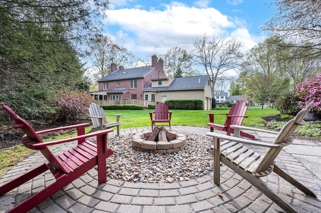 view of patio featuring an outdoor fire pit