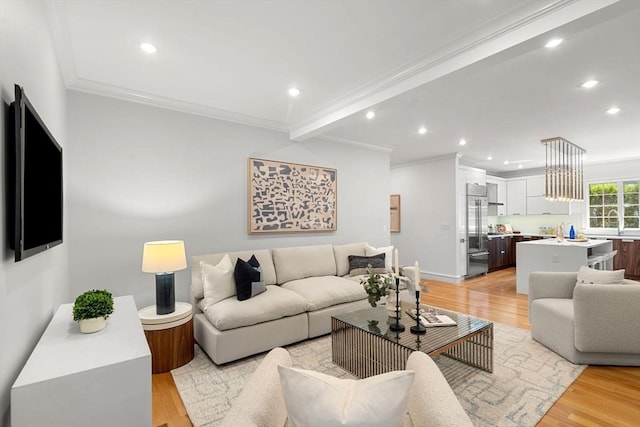 42 Coolidge St Unit 42, Brookline, MA 02446 - living area featuring light wood-style flooring, recessed lighting, and crown molding