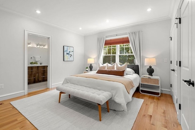 42 Coolidge St Unit 42, Brookline, MA 02446 - bedroom featuring ornamental molding, light wood-type flooring, baseboards, recessed lighting, and ensuite bathroom
