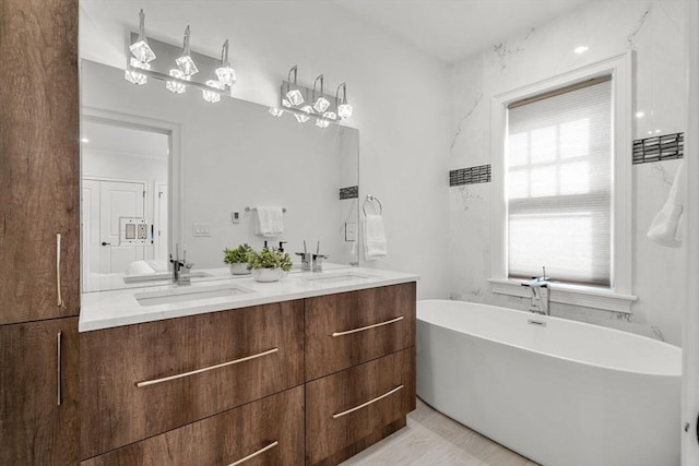 42 Coolidge St Unit 42, Brookline, MA 02446 - bathroom featuring double vanity and a freestanding bath