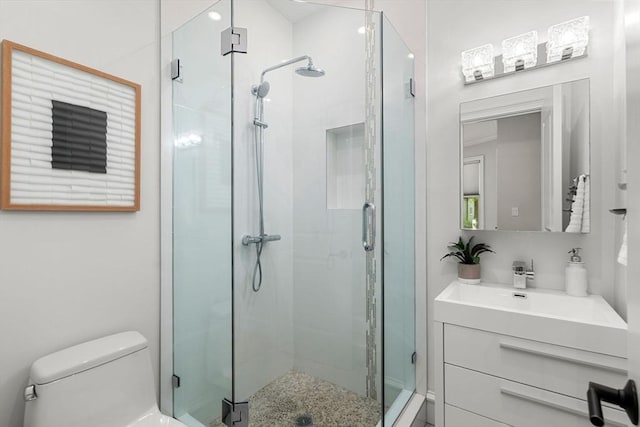 42 Coolidge St Unit 42, Brookline, MA 02446 - bathroom featuring vanity, a stall shower, and toilet