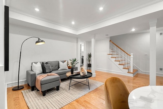 42 Coolidge St Unit 42, Brookline, MA 02446 - living room featuring stairs, wood finished floors, ornamental molding, baseboards, and recessed lighting
