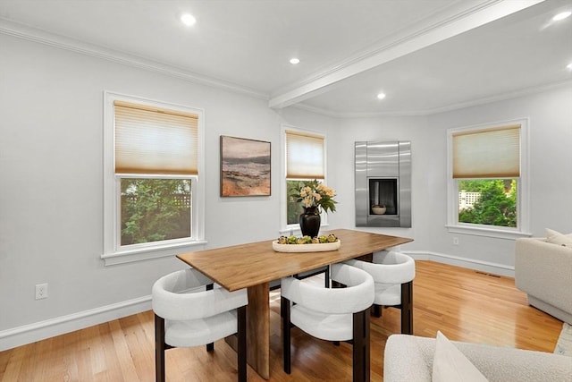 42 Coolidge St Unit 42, Brookline, MA 02446 - dining space featuring ornamental molding, light wood finished floors, baseboards, and recessed lighting