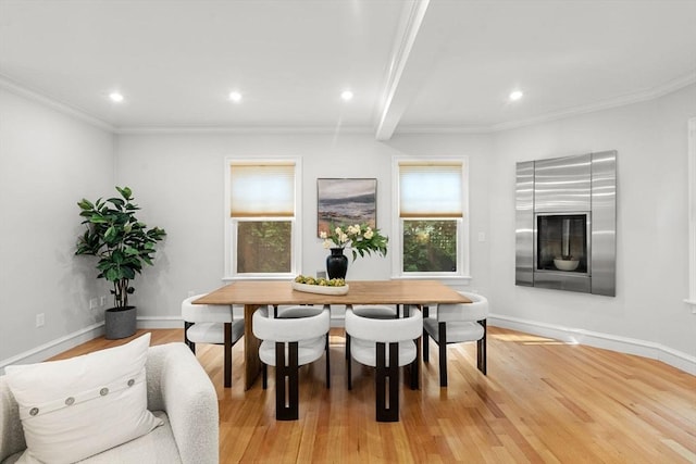 42 Coolidge St Unit 42, Brookline, MA 02446 - dining room featuring light wood-type flooring, ornamental molding, recessed lighting, and baseboards