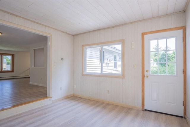 6 Marshall Rd, Beverly, MA 01915 - entrance foyer with wood finished floors, a baseboard radiator, and wood walls