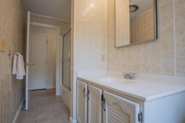 6 Marshall Rd, Beverly, MA 01915 - full bath featuring tile patterned floors, vanity, tile walls, and ornamental molding