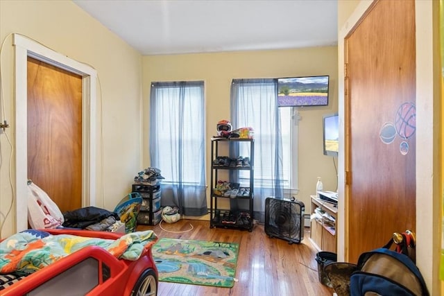 bedroom featuring wood finished floors