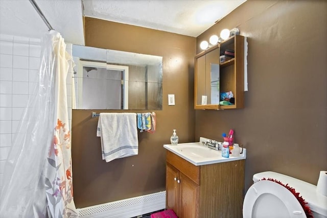 full bathroom featuring vanity, curtained shower, and toilet