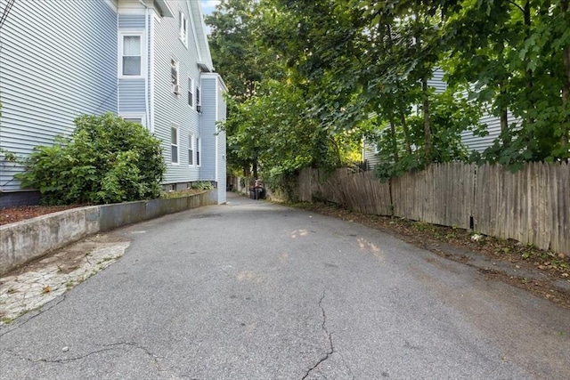 view of street with aphalt driveway
