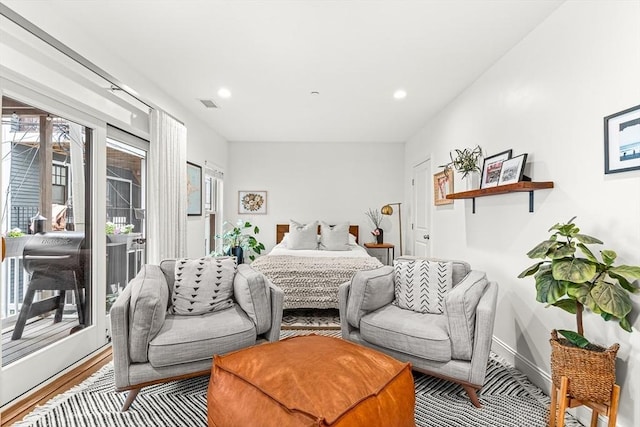 280 W 5th St Unit 101, Boston, MA 02127 - bedroom with access to exterior, recessed lighting, and wood finished floors