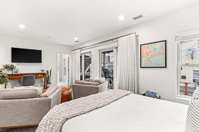 280 W 5th St Unit 101, Boston, MA 02127 - bedroom featuring access to exterior, multiple windows, recessed lighting, and wood finished floors