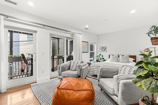 280 W 5th St Unit 101, Boston, MA 02127 - bedroom featuring access to outside, wood finished floors, and recessed lighting