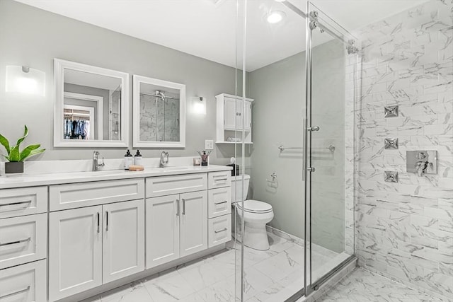 280 W 5th St Unit 101, Boston, MA 02127 - bathroom featuring marble look tiles, a stall shower, and double vanity