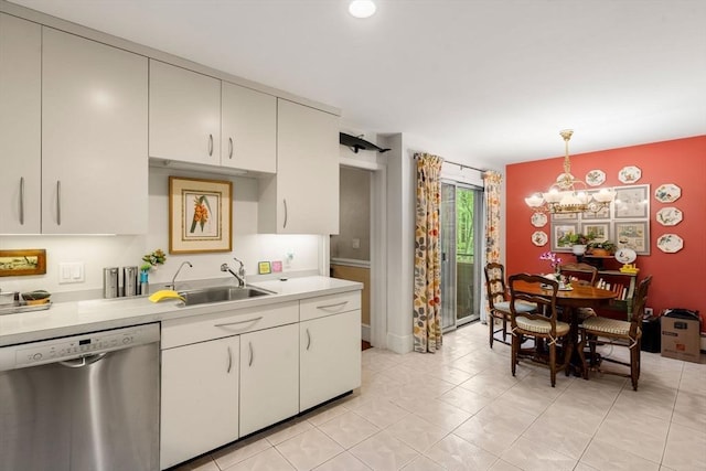 228 Allandale Rd Unit 1A, Boston, MA 02467 - kitchen with dishwasher, a sink, light countertops, a chandelier, and hanging light fixtures