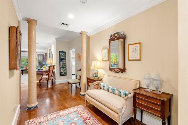 228 Allandale Rd Unit 1A, Boston, MA 02467 - sitting room featuring decorative columns, wood finished floors, crown molding, baseboards, and recessed lighting