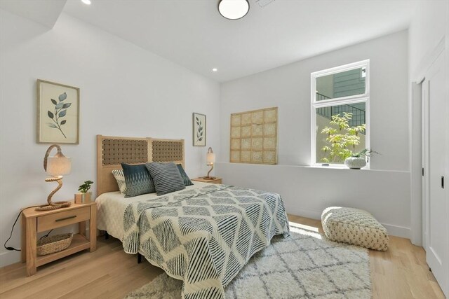 21 Eastman Rd Unit 0, Somerville, MA 02143 - bedroom featuring wood finished floors and recessed lighting