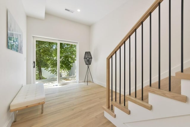 21 Eastman Rd Unit 0, Somerville, MA 02143 - stairs with wood finished floors and recessed lighting