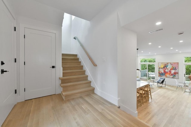 21 Eastman Rd Unit 0, Somerville, MA 02143 - stairs featuring wood finished floors and recessed lighting