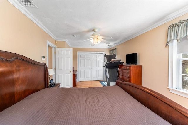 86 Whitney, Northborough, MA 01532 - bedroom with crown molding, a closet, ceiling fan, and wood finished floors