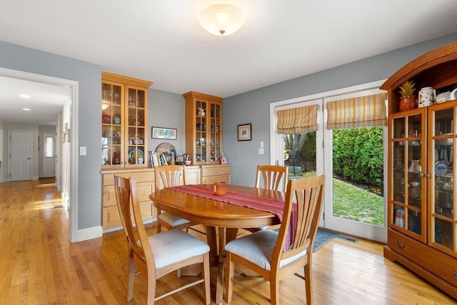 dining area featuring light hardwood / wood-style floors