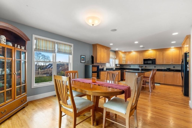 dining area featuring light hardwood / wood-style floors