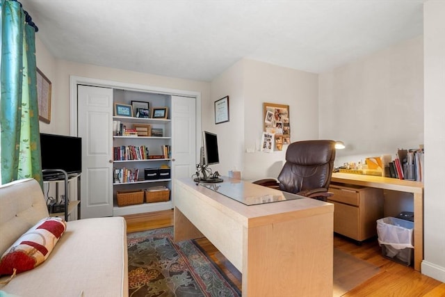 home office featuring hardwood / wood-style floors