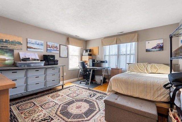 bedroom featuring light hardwood / wood-style floors