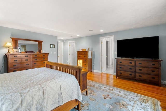 bedroom featuring light hardwood / wood-style floors