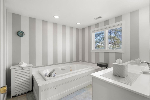 bathroom featuring a tub to relax in