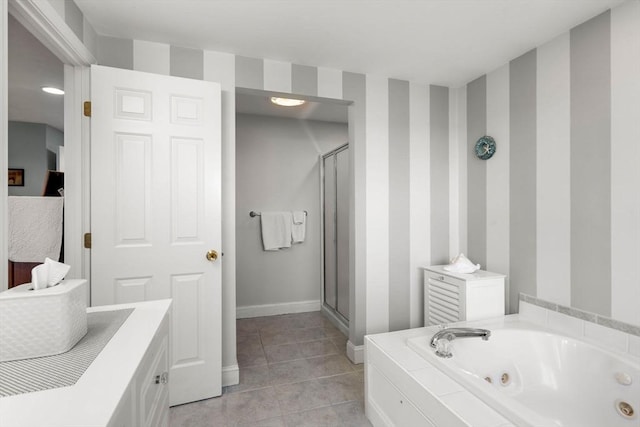 bathroom featuring tile patterned floors and independent shower and bath