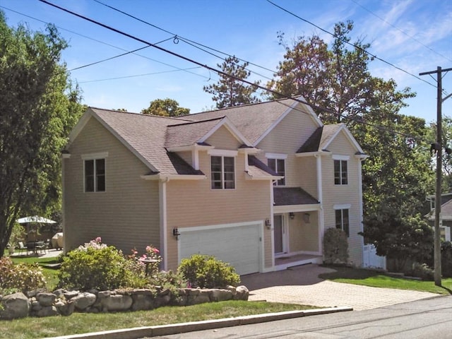 view of front property with a garage