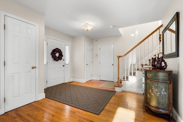 foyer with hardwood / wood-style floors