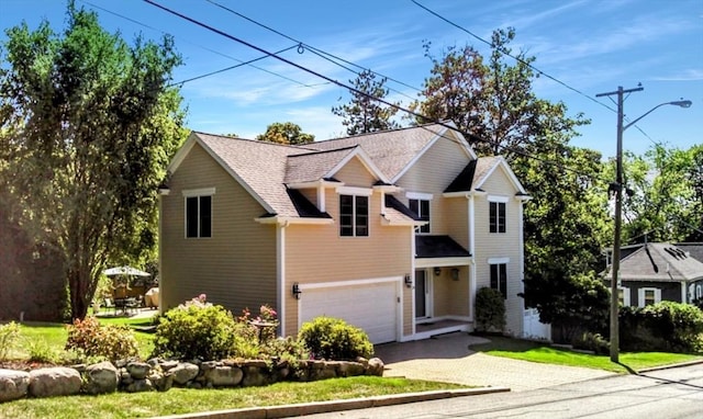 view of front of home featuring a garage