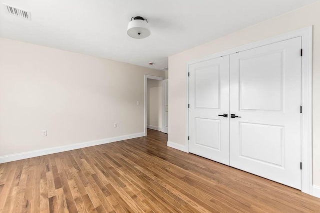 20 Sperry Ln, North Attleboro, MA 02760 - unfurnished bedroom featuring light wood finished floors, baseboards, and a closet