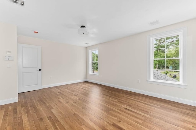 20 Sperry Ln, North Attleboro, MA 02760 - unfurnished room with light wood finished floors, healthy amount of natural light, and baseboards