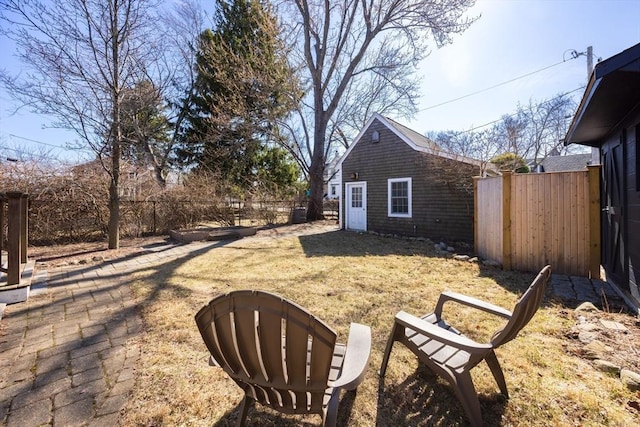 view of yard featuring a fenced backyard