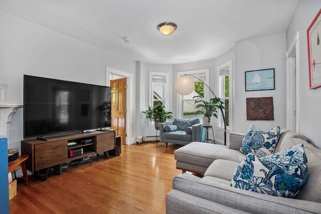 4 Marlou Unit 3, Boston, MA 02130 - living area with a baseboard heating unit and wood finished floors