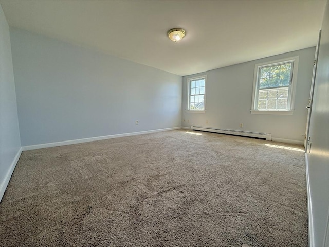 56 Center St Unit 2-3, Dennis, MA 02639 - carpeted empty room with a baseboard radiator and baseboards