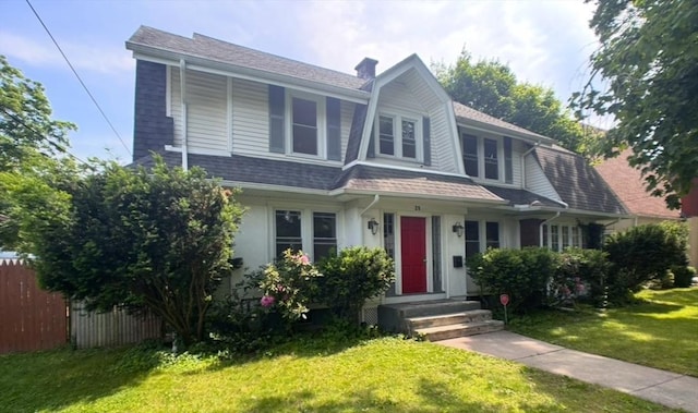 29 Neptune Ave, West Springfield, MA 01089 - view of front facade featuring a chimney, a shingled roof, stucco siding, and a gambrel roof