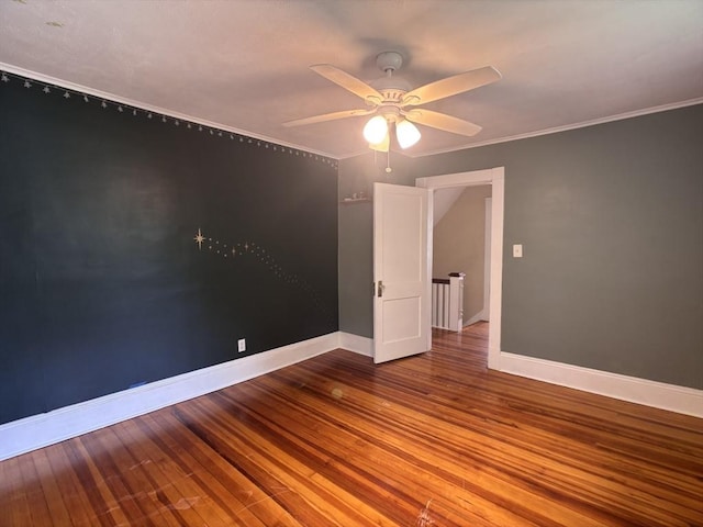 29 Neptune Ave, West Springfield, MA 01089 - empty room with a ceiling fan, baseboards, wood finished floors, and crown molding