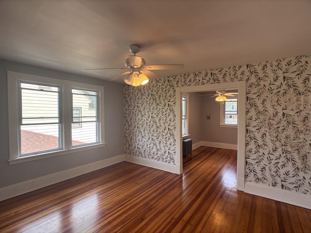 29 Neptune Ave, West Springfield, MA 01089 - spare room with wallpapered walls, dark wood-style flooring, baseboards, and a ceiling fan