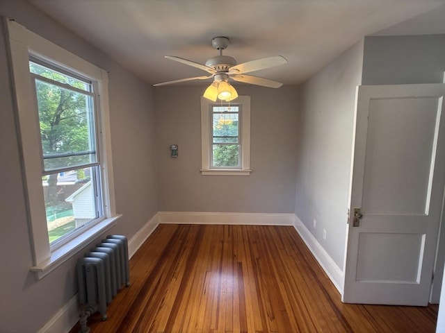 29 Neptune Ave, West Springfield, MA 01089 - unfurnished room featuring radiator heating unit, baseboards, and healthy amount of natural light