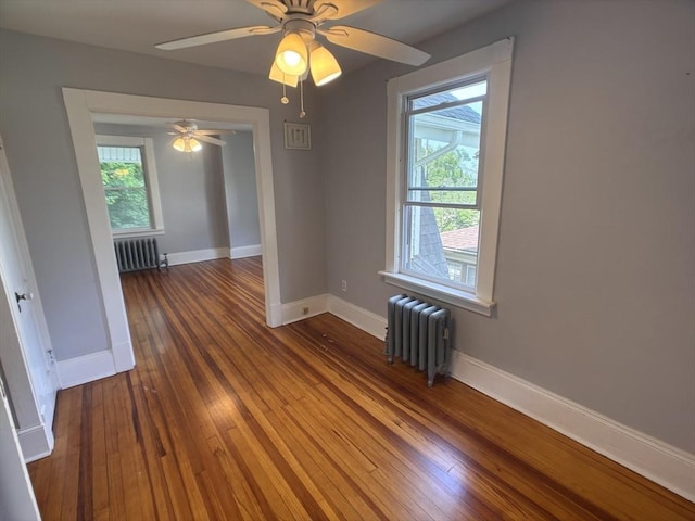 29 Neptune Ave, West Springfield, MA 01089 - empty room featuring radiator heating unit, healthy amount of natural light, and baseboards