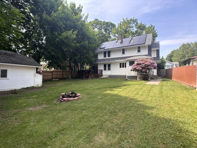 29 Neptune Ave, West Springfield, MA 01089 - view of yard with a fire pit
